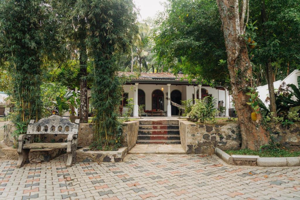 The tropical garden entrance to Lime Ahangama