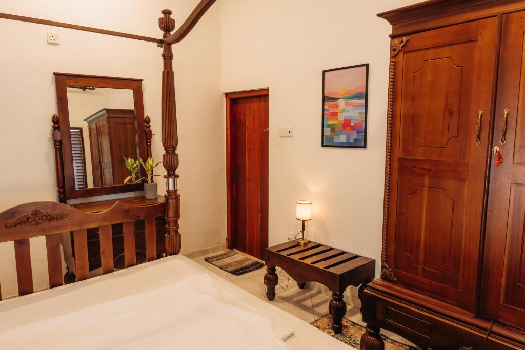 Warm private room with a traditional wooden bed